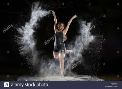 ballet-dancer-throwing-powder-in-a-wing-pattern-FGBXJT.jpg